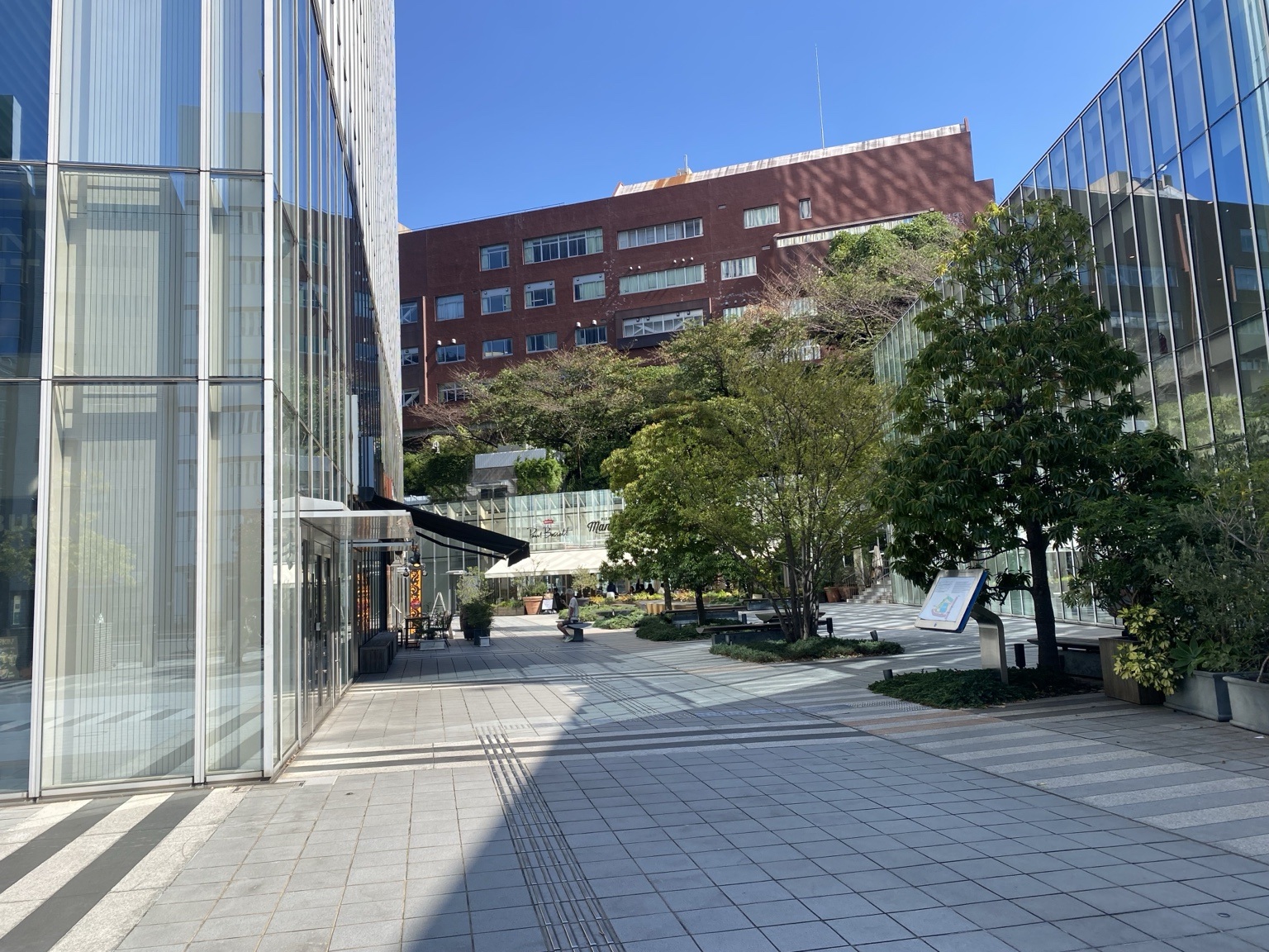 Tree-lined plaza next to The Prudential Tower